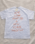 Aime Leon Dore White Back-Print T-Shirt with Peach Hand‑Lettered Graphic — vintage back-print tee hero ecommerce image