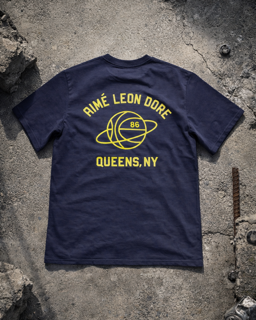 Aimé Leon Dore Navy Graphic T‑Shirt — Yellow 'Queens, NY' Basketball Planet Back Print | vintage Aimé Leon Dore tee alternate ecommerce image