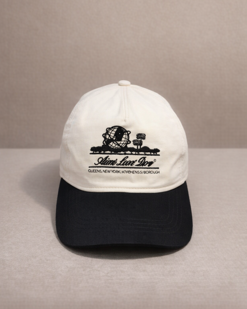 Aime Leon Dore two-tone black & cream flat-brim cap with globe embroidery — vintage urban-style cap for men hero ecommerce image