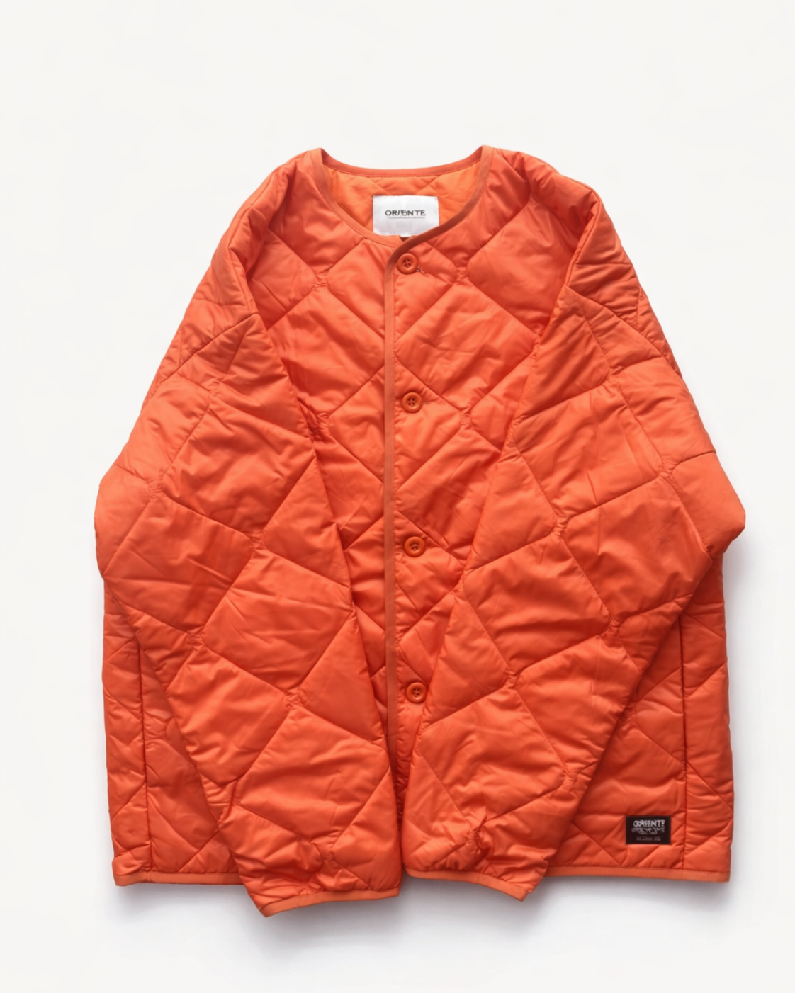 Carhartt orange quilted jacket for men — button-up utility quilted jacket hero ecommerce image